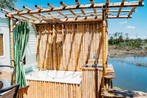 Cozy waterfront bamboo retreat, perfect for fishermen or outdoor enthusiasts 
