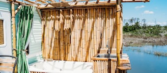 Cozy waterfront bamboo retreat, perfect for fishermen or outdoor enthusiasts 