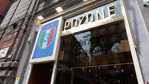 A building facade with a sign for "POZONE Caffetteria" and a logo with a shield and a number 3. - CIVICO 237 (Naples)