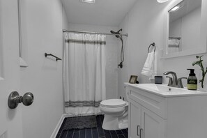 Shower, towels, toilet paper