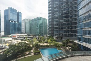 Pool - Uptown Bliss: Chic 1BR Condo (Taguig)