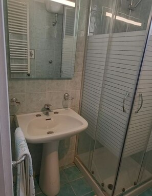 Hair dryer, bidet, towels, soap