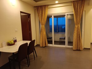 Family Quadruple Room | Living area