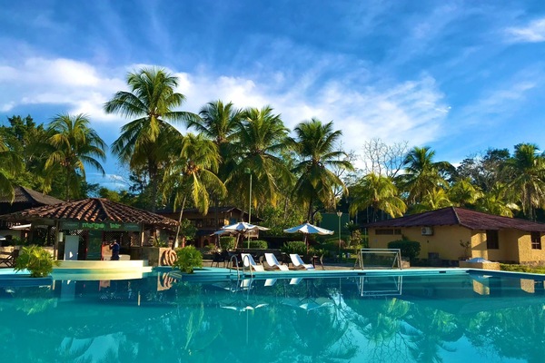 Outdoor pool, open 10:00 AM to 8:00 PM, pool umbrellas