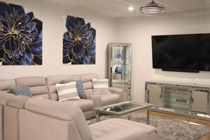 Smart TV, fireplace, smart speakers