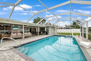 Outdoor pool, a heated pool - Updated pool home w/ privacy fence and large pool! (Cape Coral)