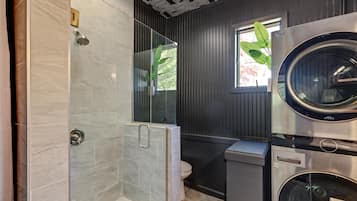 Shower, hair dryer, towels, soap