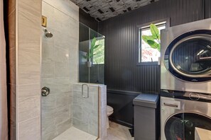 Shower, hair dryer, towels, soap