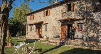 Tuscan farmhouse apartment on two levels with sea view