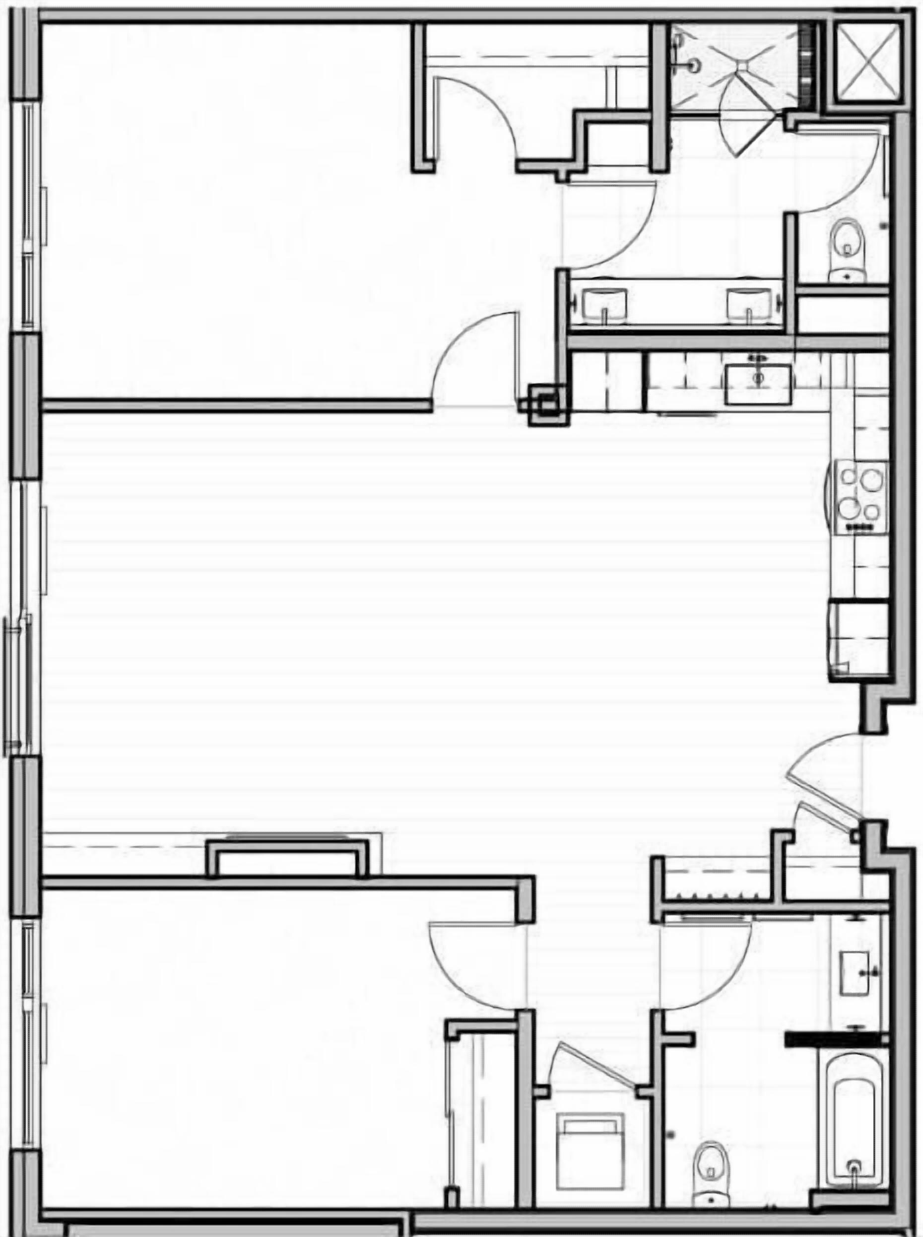 Een plattegrond van een hotelkamer met een badkamer, kitchenette en een klein zithoekje.