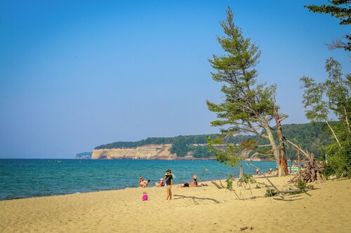 See the best of Michigan's Upper Peninsula in this Family Ready Lake-side Cabin