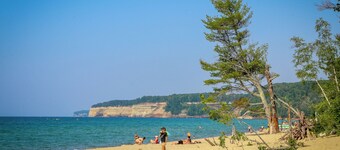 See the best of Michigan's Upper Peninsula in this Family Ready Lake-side Cabin