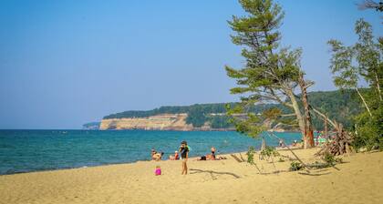 See the best of Michigan's Upper Peninsula in this Family Ready Lake-side Cabin