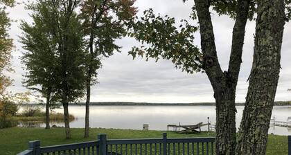 See the best of Michigan's Upper Peninsula in this Family Ready Lake-side Cabin