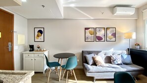 Apartamento luxo | Área de estar | TV de tela plana