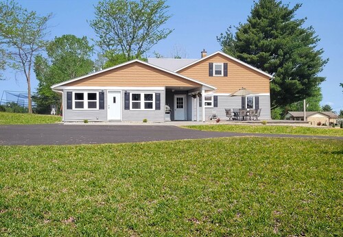 Bring the whole family to this great home with an acre of room for fun.