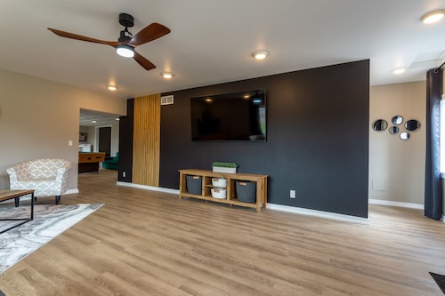 Bring the whole family to this great home with an acre of room for fun.