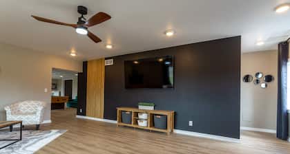 Bring the whole family to this great home with an acre of room for fun.