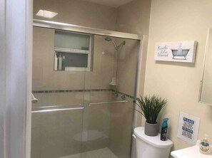 Shower, hair dryer, towels, soap