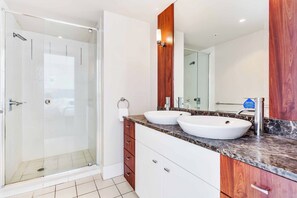 Bathtub, hair dryer, towels, soap