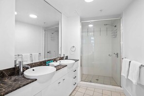 Bathtub, hair dryer, towels, soap