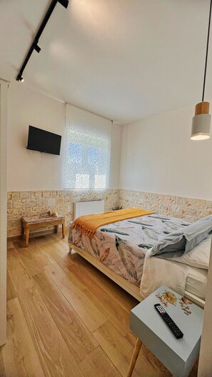 3 室のベッドルーム、セーフティボックス (室内)、アイロン / アイロン台、旅行用ベビーベッド