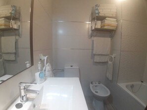 Hair dryer, towels, soap, toilet paper