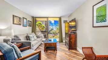 Luxury Condo, 1 Queen Bed with Sofa bed, Ocean View, Beachside | Living area | 80-inch Smart TV with cable channels