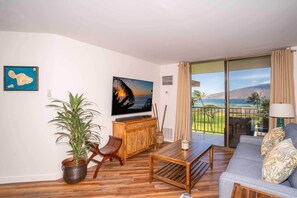 Luxury Condo | Living area | 80-inch Smart TV with cable channels - Oceanfront Penthouse Vistas (Kihei)