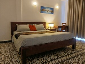 In-room safe, desk, laptop workspace, blackout drapes - Andy's Place (Siem Reap)