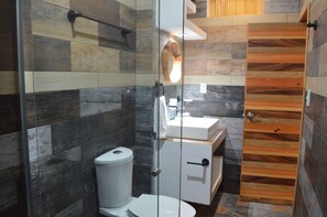Family Quadruple Room, 1 Bedroom | Bathroom | Shower, rainfall showerhead, towels, soap - Hotel Axolotl (Puerto Escondido)