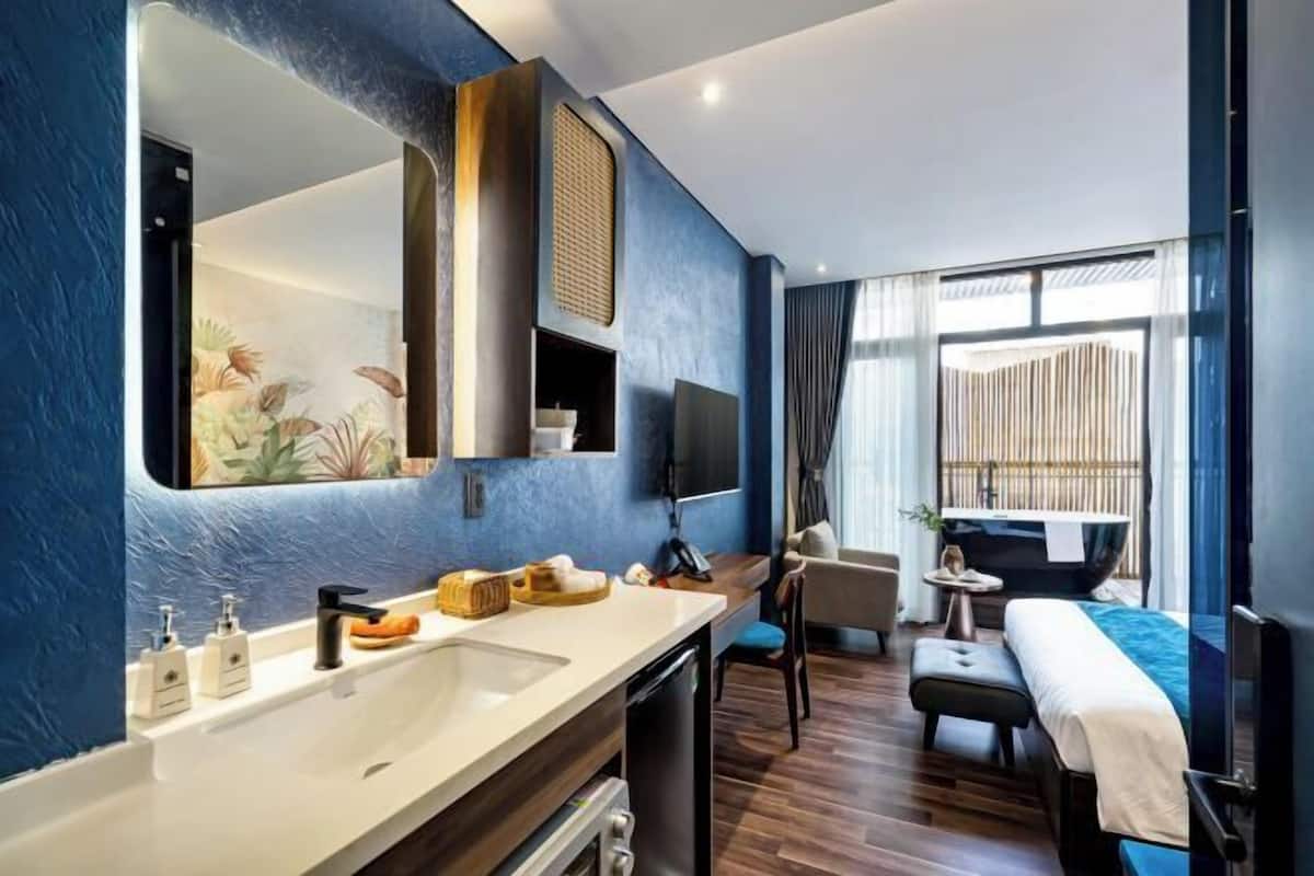 Luxe beddengoed, bedden met traagschuimmatras, een minibar
