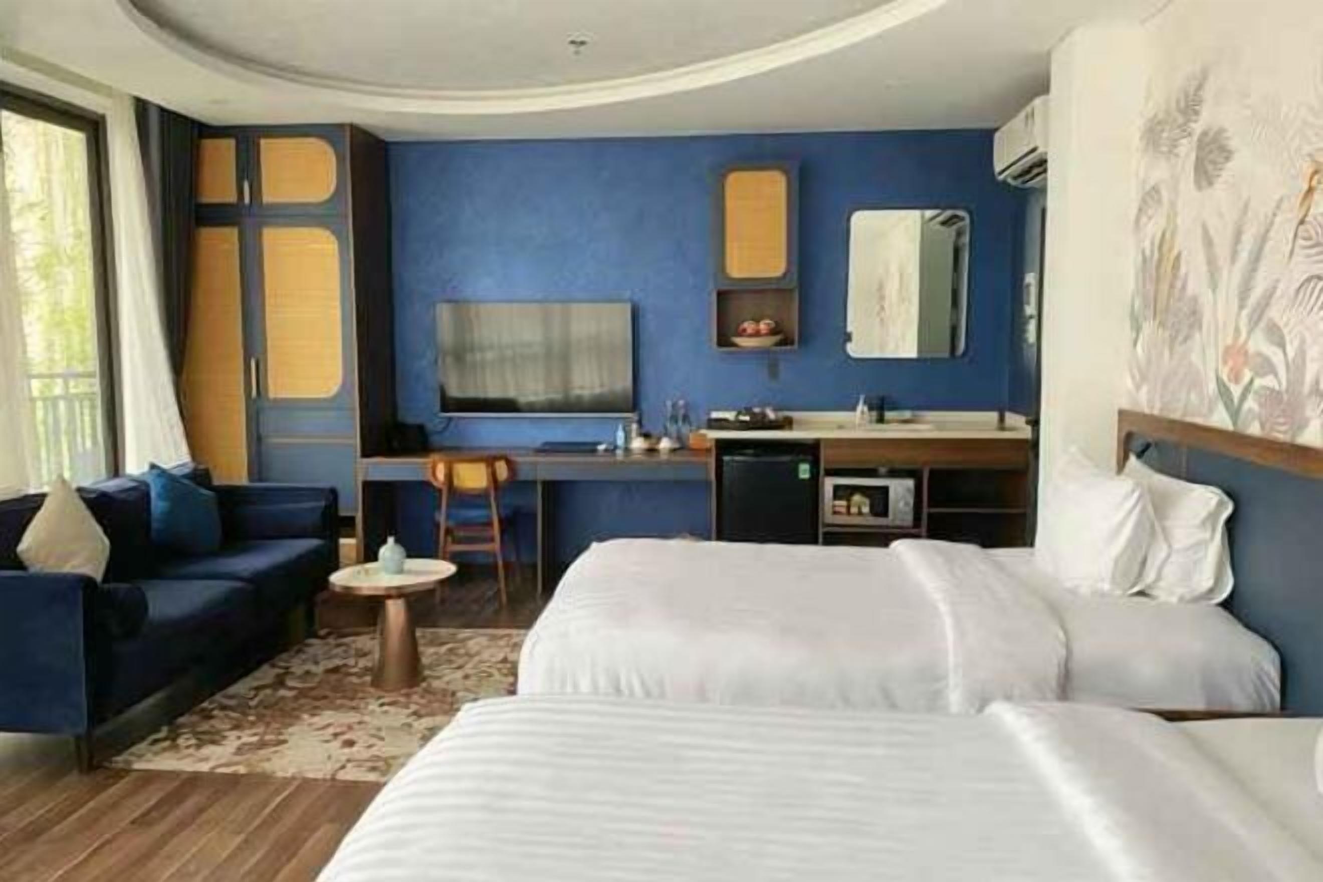 Luxe beddengoed, bedden met traagschuimmatras, een minibar