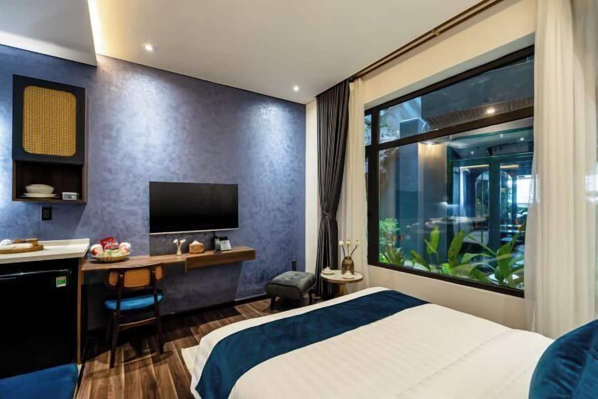 Luxe beddengoed, bedden met traagschuimmatras, een minibar