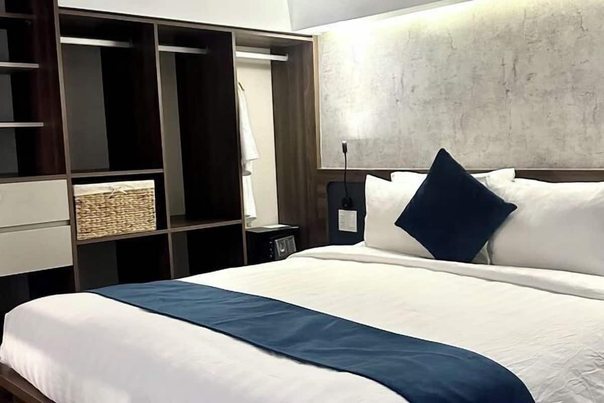 Luxe beddengoed, bedden met traagschuimmatras, een minibar