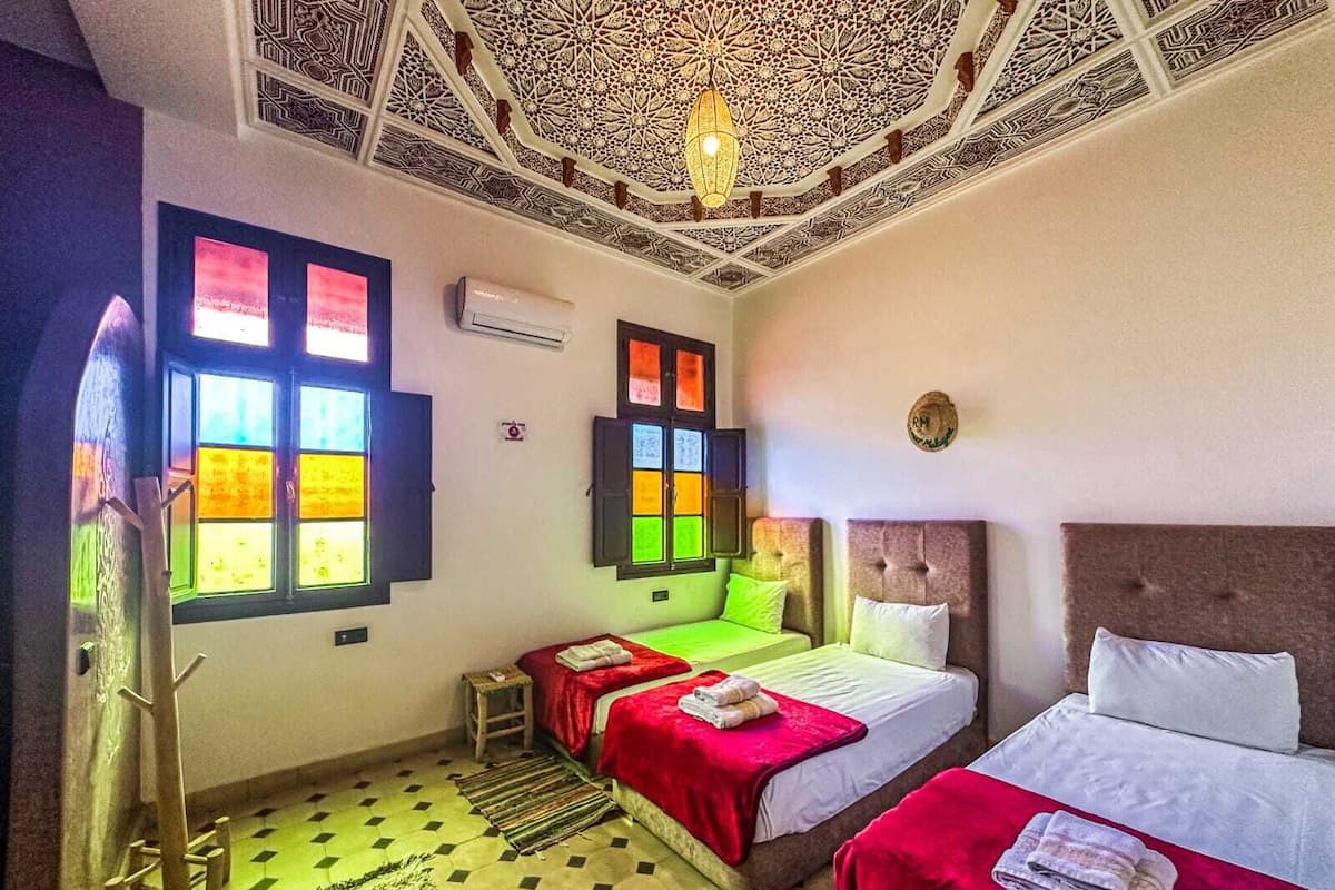 Panoramic Triple Room | 1 bedroom, down comforters, memory foam beds, individually decorated