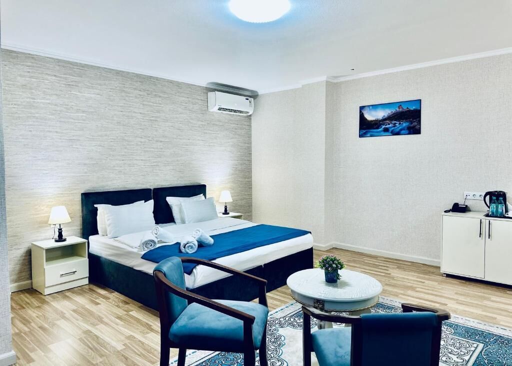 Deluxe Double Room, 1 King Bed, Air conditioning, City View | In-room safe, desk, laptop workspace, blackout curtains