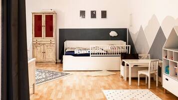 1 bedroom, desk, iron/ironing board, travel crib