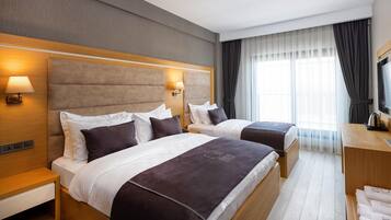 Standard Triple Room | Roupas de cama antialérgicas