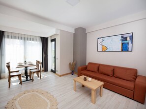 Suite Land View | Khu phòng khách | TV LCD 96-inch có truyền hình vệ tinh, TV 