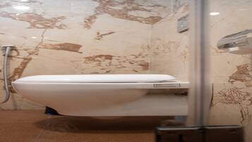 Shower, rainfall showerhead, towels, soap