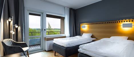 Desk, laptop workspace, free WiFi, bed sheets