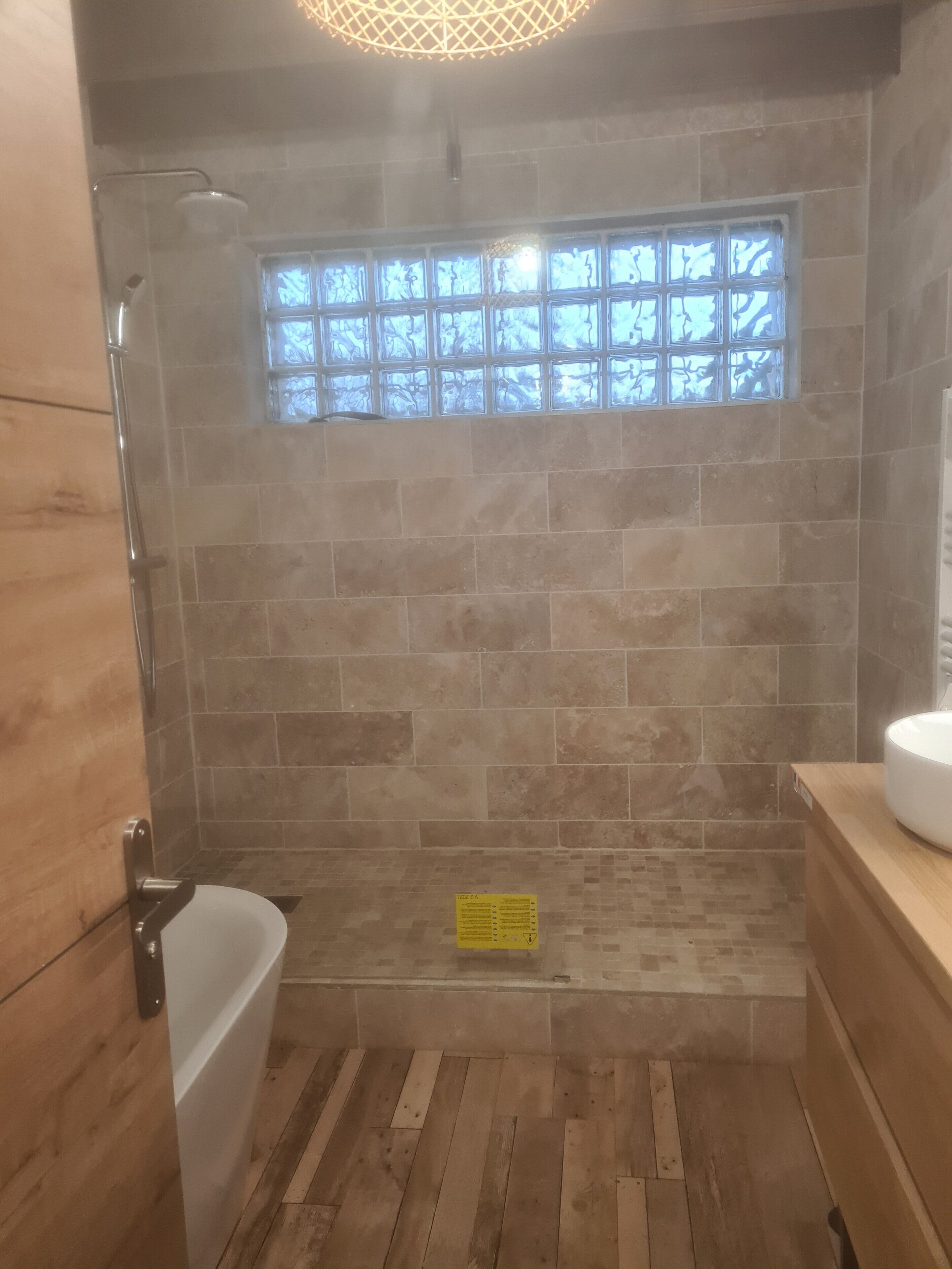 Bathtub, hair dryer, towels