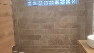 Bathtub, hair dryer, towels