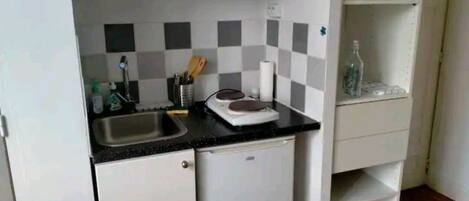 Fridge, microwave, cookware/dishes/utensils