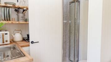 Fridge, electric kettle, toaster, cookware/dishes/utensils