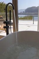 Slow Experience Room | Bathroom | Free toiletries, hair dryer, towels, soap