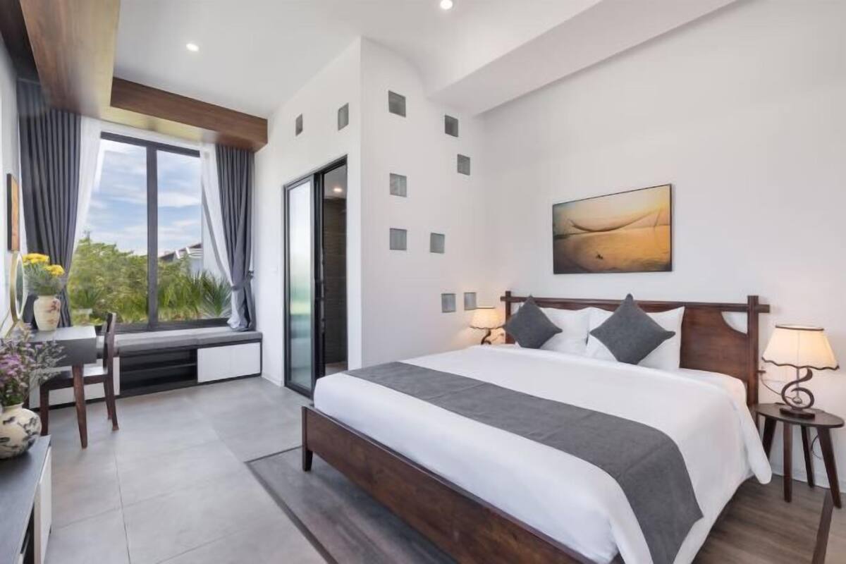 Premium bedding, memory foam beds, desk, laptop workspace