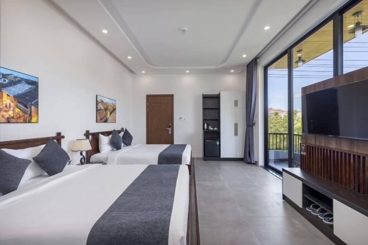 Premium bedding, memory foam beds, desk, laptop workspace