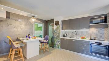 Family Apartment, 2 Bedrooms (Casa Gio Few Minutes from the Lake) | Private kitchen | Fridge, microwave, oven, stovetop